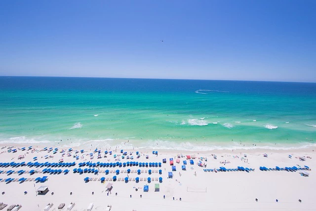 white sandy beach, turqouise ocean, blue sky